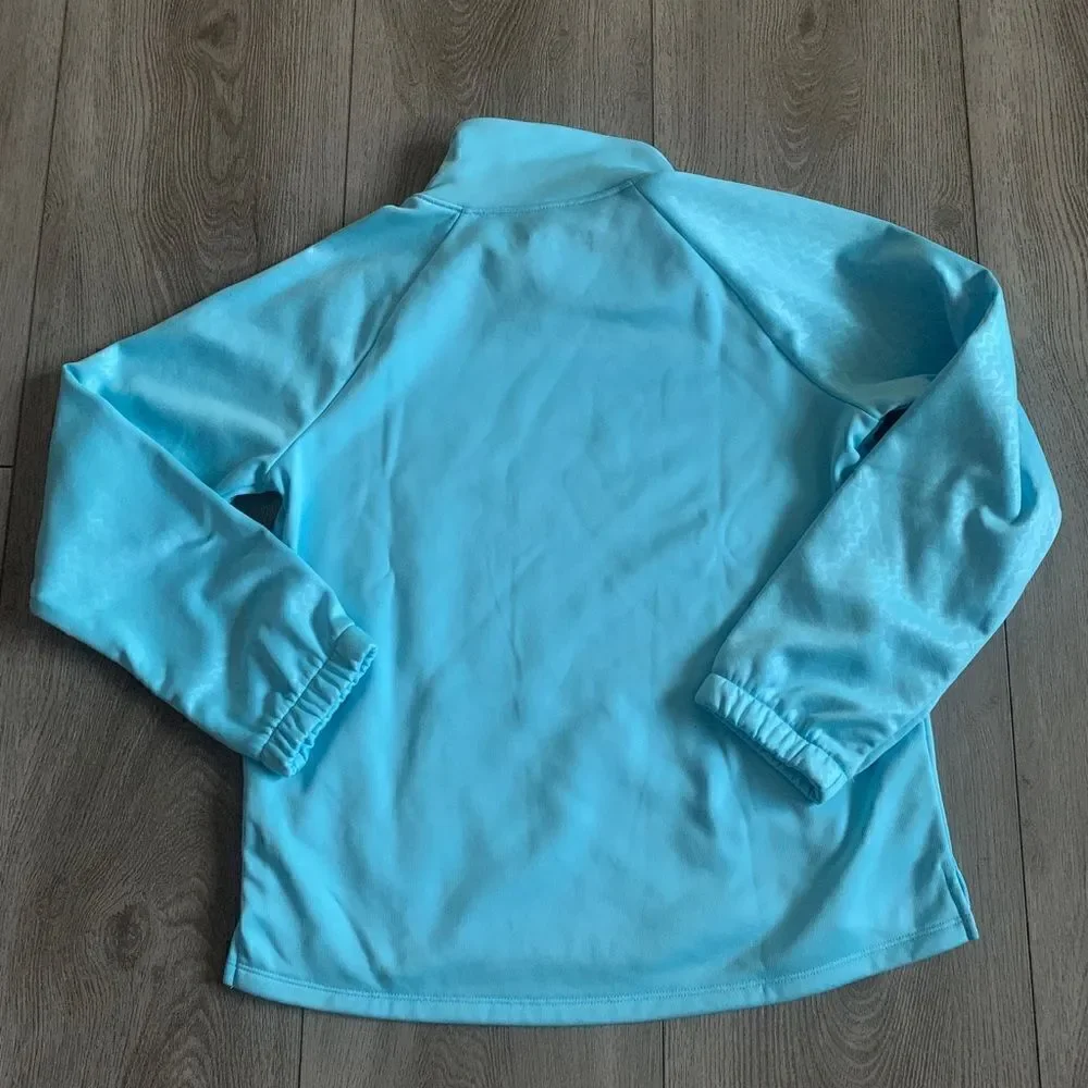 Under Armour girls sweater color baby blue. NWOT